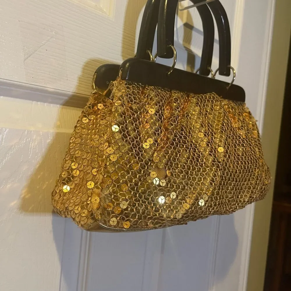 Gold Sequins with wooden black handles and frame handbag.